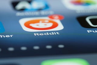 Close up shot of reddit icon on a smartphone