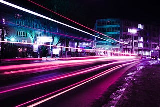 Long exposure photo of lights from cars in a city
