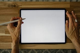 Ready to draw or write on a blank tablet screen.