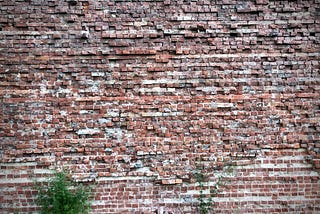 A crumbling brick wall