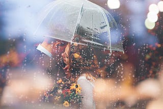 a couple under an umbrella