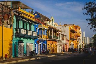 downtown street scene, colorful buildings