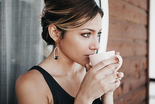 Girl sipping tea