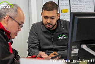 Otto Team member Abdul with a member of the Otto Family