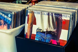 Picture of a Bruce Springsteen “Born in the U.S.A.” LP record in a record bin.