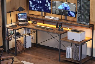 Spacious L-Shaped LED Home Office Desk with Adjustable Monitor Stand and Power Outlets | Image