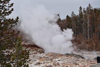 an extremely beautiful geyser about to burst. the anticipation is palpable