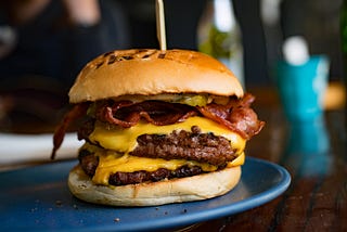 A double bacon cheeseburger dripping with cholesterol, saturated fat, and cancer-causing carcinogens.