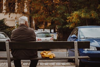 elderly man on bench