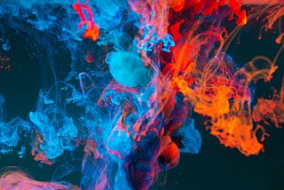 abstract image of blue and orange colours mixed together like smoke