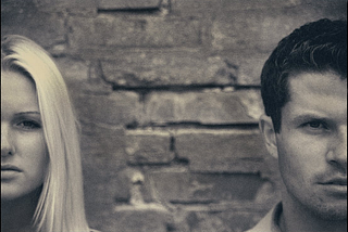 Man and woman standing beside each other