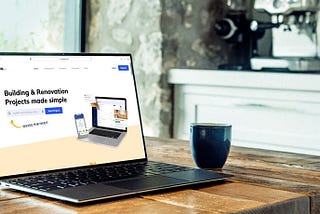 Laptop on a table open to the iknowa website