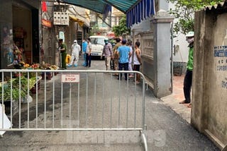 Vietnam's capital city of Hanoi locks down a street and isolates a pizza restaurant after new…