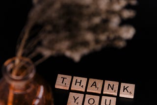 Thank you spelled out in Scrabble letter blocks