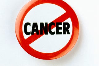 Cancer crossed out in a red circle