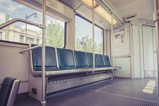 An empty bench on a train