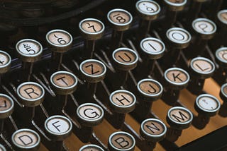Close up of the keys on an antique typewriter.
