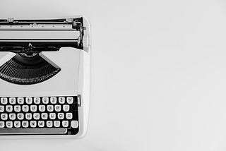 White portable typewriter, off-center