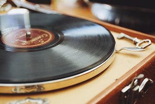 picture of an old vinyl record on a turntable