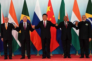 The Shift Away from the US Dollar: How BRICS Nations and Cryptocurrencies Are Winning and Losing