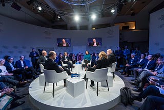 An image of a debate between a group of people.