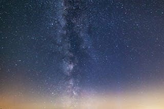 Photo of stardust by Evgeni Tcherkasski provided by Unsplash