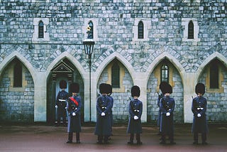 Soldiers protecting building entrance