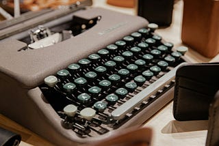 Why are there blocks of wood surrounding this typewriter? This better not be a joke on us the readers…