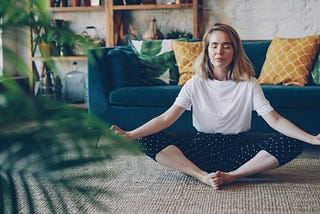 A woman meditates.