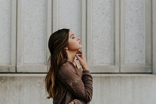 Woman thinking, eyes closed