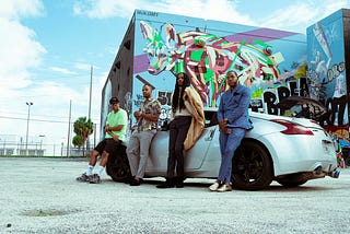 whole crew chilling by the Nissan 