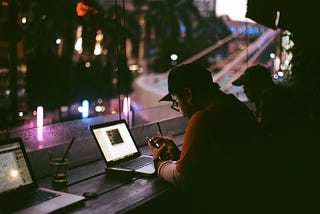 Person working late into the night on their laptop