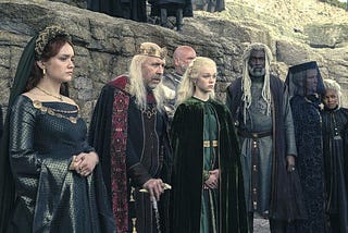The Targaryen and Velaryon families gather for Laena Velaryon’s funeral in Driftmark.