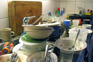 Sink of dirty dishes and spoons. Spoonies, save your spoons!