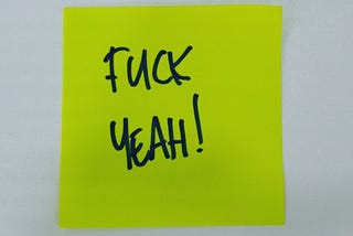A Post-it note reading ‘fuck yeah!’