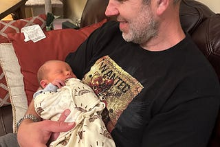Me and my newborn granddaughter
