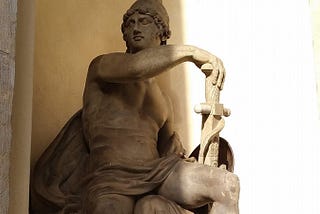 Statue of Roman warrior with helmet and sword