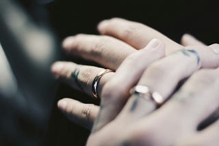 wedding bands on hands