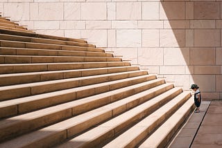 Child looking at stairs.