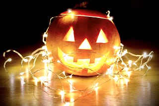 A lit up jack-o-lantern.