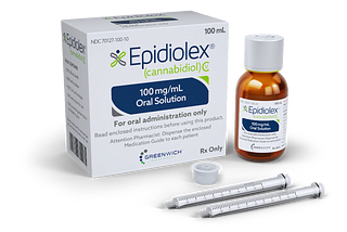 A box of Epidiolex, A bottle of Epidiolex, 2 syringes