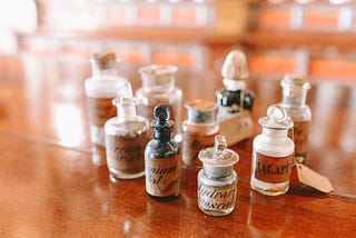 A collection of small antique apothecary bottles