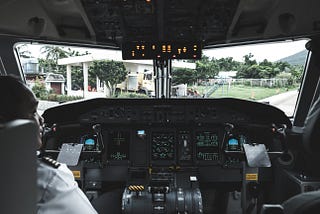 In the cockpit of Boeing 737 max 8 airplane, a large wheel was located between the pilots to tell the stabilizer is automatically controlled.