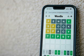 phone with Wordle game on it