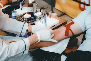 Patient giving a blood sample.