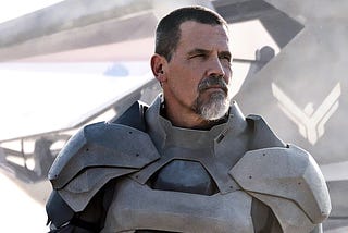 Actor Josh Brolin posing in armor in the film Dune