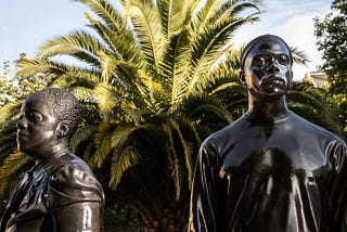 Thomas J Price’s new bronze sculptures of two people, entitled “Warm Shores”, outside Hackney Town Hall. The larger than life figures are based on digital 3D images of over 30 Hackney residents with a personal connection to Windrush.