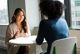 Woman is interviewing another woman for a job.