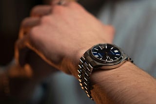 A man’s hands and arm.