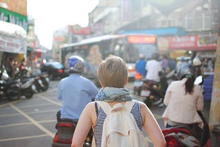 Lady wearing a school bag